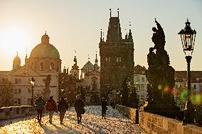 empty Charles Bridge in Prague, sunrise