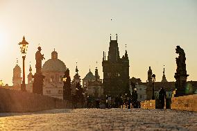 empty Charles Bridge in Prague, sunrise