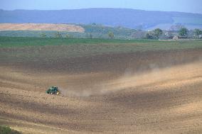 Tractor, dry field, farmer, drought