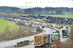 trucks are jammed on the motorway D5 in front of the Czech-German border crossing in Rozvadov