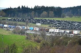 trucks are jammed on the motorway D5 in front of the Czech-German border crossing in Rozvadov