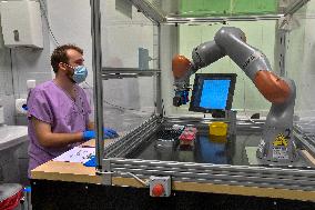 Na Bulovce hospital, robotic assistant designed to aid in testing samples