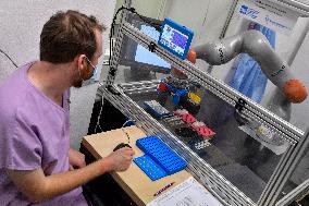 Na Bulovce hospital, robotic assistant designed to aid in testing samples