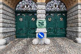 Pilsner Urquell Brewery main gate with a protection face mask