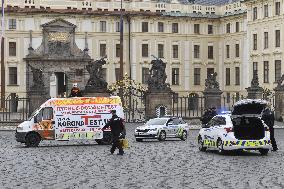 Hradcanske square, delivery van, ad for selling covid-19 tests and a protest against a pig slaughter organised by Mynar