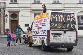 Hradcanske square, delivery van, ad for selling covid-19 tests and a protest against a pig slaughter organised by Mynar