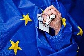 European Union, EU, money, bank notes, currency, EUR, euro, flag, hand, fist, banknotes