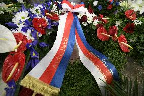 a wreath from Czech Prime Minister Andrej Babis lies in the lobby of the Czech Radio building in Prague