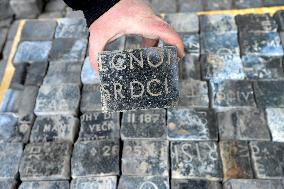 hundreds of cobblestones, made of cut Jewish gravestones, found during a reconstruction of Wenceslas Square