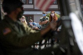 Convoy of U.S. Army World War Two military vehicles, celebrations,