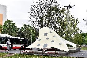 Public transport bus stop Loosova disinfection, miniature of National Library project