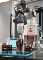 robotic workplace openTube, robot ABB, samples covid-19, coronavirus