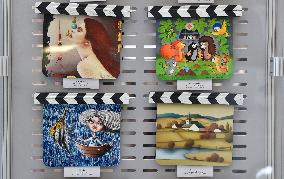 The exhibition of painted clapperboards