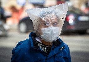 man, coronavirus, face mask, plastic sack, bag