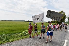 thousands join march in protest at sandy gravel mining