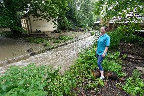 firefighters evacuated the old people's home in Hermanuv Mestec after a nearby pond dam overflowed amid torrential rains