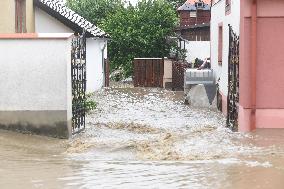firefighters evacuated the old people's home in Hermanuv Mestec after a nearby pond dam overflowed amid torrential rains