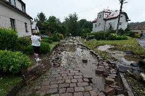 flood damage after torrential rains in Vapenny Podol Village