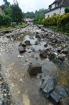 flood damage after torrential rains in Vapenny Podol Village