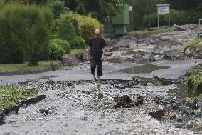 flood damage after torrential rains in Vapenny Podol Village