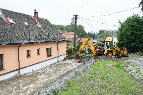 flood damage after torrential rains in Vapenny Podol Village