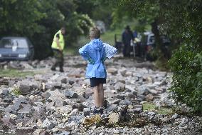flood damage after torrential rains in Vapenny Podol Village
