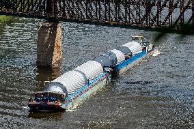 cargo ships loaded of beer tanks for Pilsner Urquell brewery