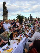 Dinner at 500 metre long table, Charles Bridge, Prague, citizens, Vltava River