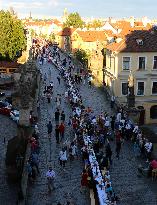 Dinner at 500 metre long table, Charles Bridge, Prague, citizens, Vltava River