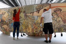 installation of 7 x 3,5 metre canvas with work by Alfons Mucha