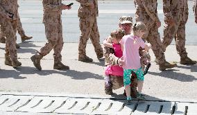 Parade of Czech military's 20th task group, soldiers, father, child