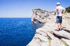 Telascica Nature Park, cliff, tourist, man