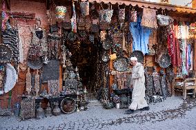 sell of souvenirs, cookware, products from letaher and wood  in medina