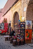 sell of souvenirs, cookware, products from letaher and wood  in medina