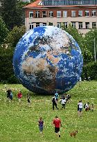 giant inflatable model of the planet Earth