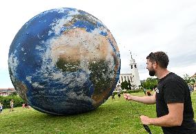 giant inflatable model of the planet Earth