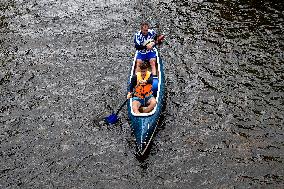 water tourists in a boat on the Orlice river