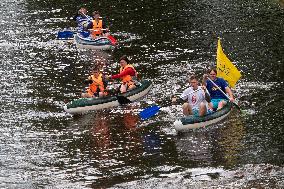 water tourists in a boat on the Orlice river, boats