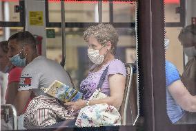 Woman face mask, public transport