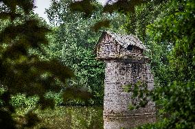 curious wooden hut on the pillar of the bridge of a former branch line