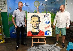 Dominik Hasek, Milos Krecek, a portrait of legendary hockey goalie Dominik Hasek of Lego interlocking plastic bricks