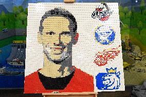 A portrait of legendary hockey goalie Dominik Hasek of Lego interlocking plastic bricks