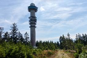 Forested highlands, mountain Brdy, meteorological tower of Brdy