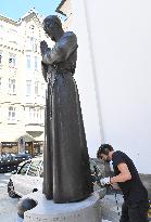 installation of statue of priest Martin Streda