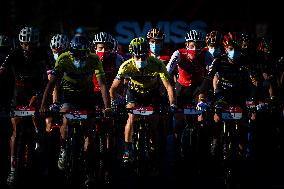 Nino Schurter, bikers, start of Swiss Epic, face mask