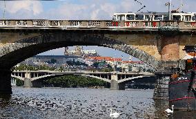 Jiraskuv Bridge and Palackeho bridge front of Prague Castle