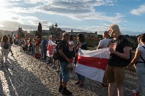 symbolic human chain at the Charles Bridge in Prague, support for human rights and free elections in Belarus