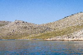 Kornati Islands National Park, The Kornati archipelago, stone cross, crosses, memorial to firefighters