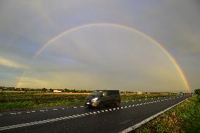 rainbow over a road