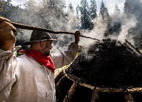 charcoal pile, charcoal burner